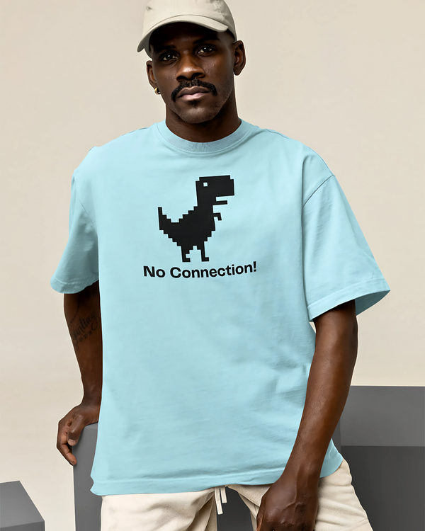 Man wearing a light blue t-shirt with a pixelated dinosaur graphic and 'No Connection!' text.